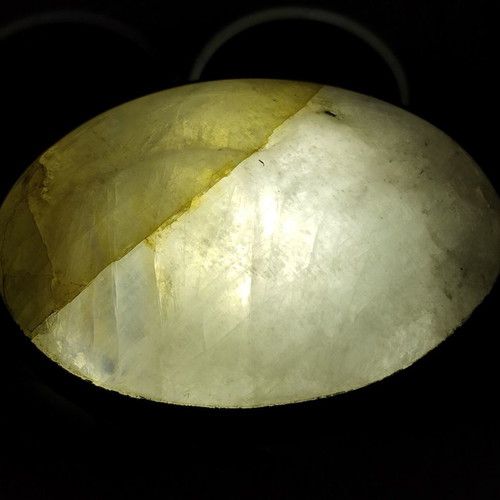 Metal necklace with oval moonstone semi-precious stone used