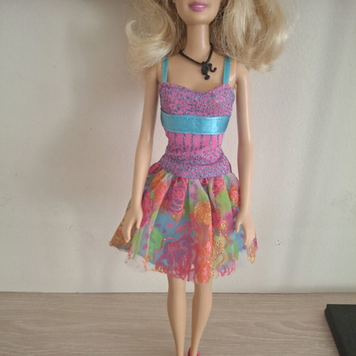 Barbie doll with colorful dress new