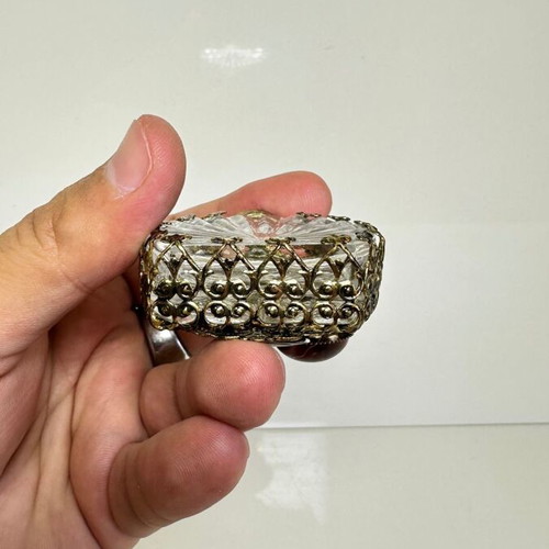 Vintage perfume flacon with filigree metalwork and red cabochon