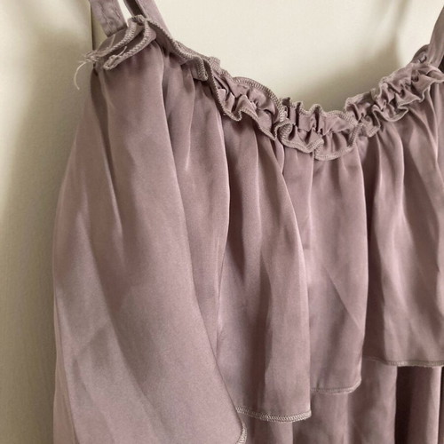 Asymmetric top like new, synthetic with ruffles, size M