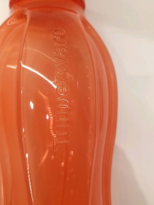Tupperware bottle one liter new orange