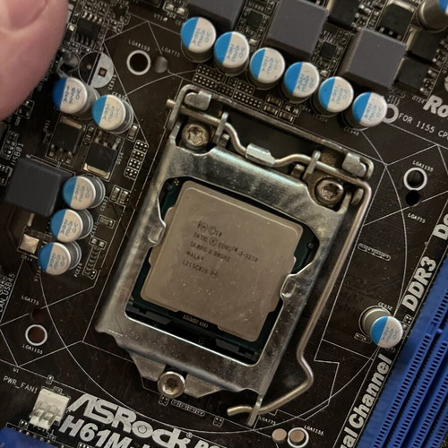 ASRock H61M-HVS motherboard with Intel Core i3-3220, Corsair DDR3 RAM, Armaggeddon 470W PSU