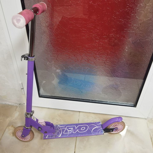 Children's scooter used, purple with 3 height levels