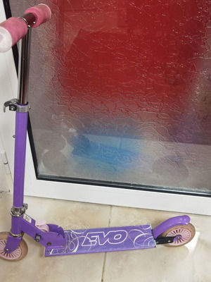 Children's scooter used, purple with 3 height levels