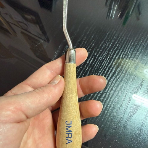 Rug hook like new with wooden handle