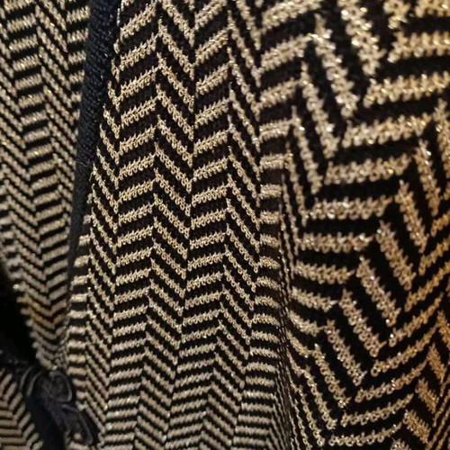 Black Kazaka with gold knit used, size L