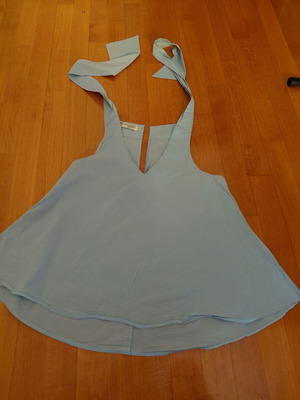 Moutaki top like new, blue with back opening and neck tie