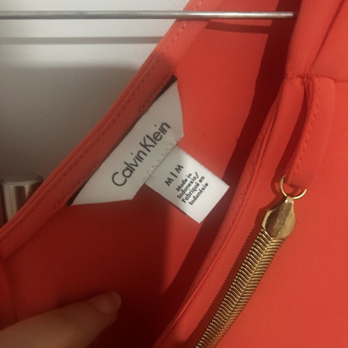 Calvin Klein blouse medium coral with gold decoration like new