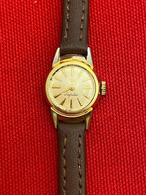 Wristwatch women's used, wind-up, metal, gold color, 1960s era