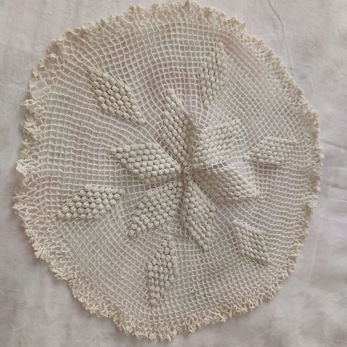 Two small handmade crochet round table linens used, beige and brown