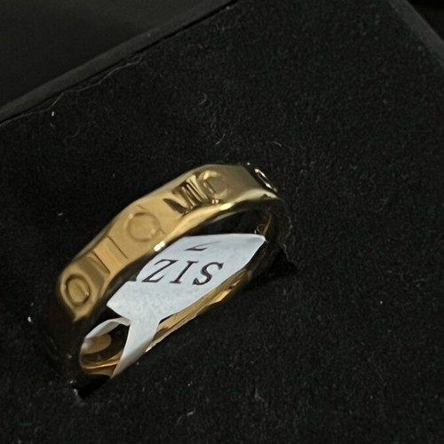 Ring new, gold-tone stainless steel with modern design