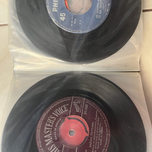 Vinyl 45 rpm records used, two cases with over fifty laiko and rembetika