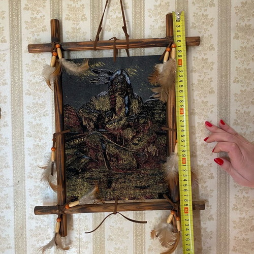 Wall decor like new with Native American figure and feathers