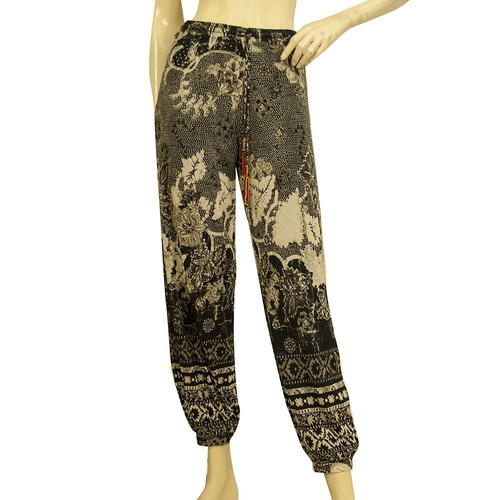 Fuzzi floral black and beige trousers used, size S