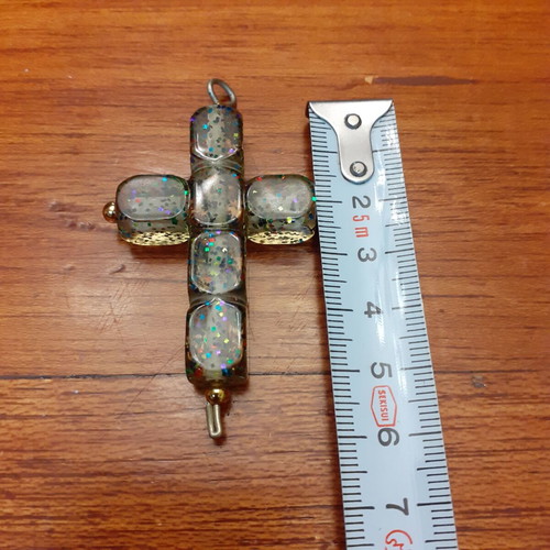 Cross large with glitter used, synthetic material
