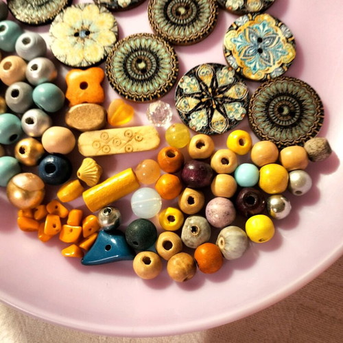 Decorative beads and buttons used, wooden