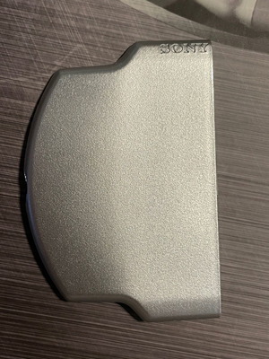 PSP Slim καπάκι μπαταρίας καινούργιο