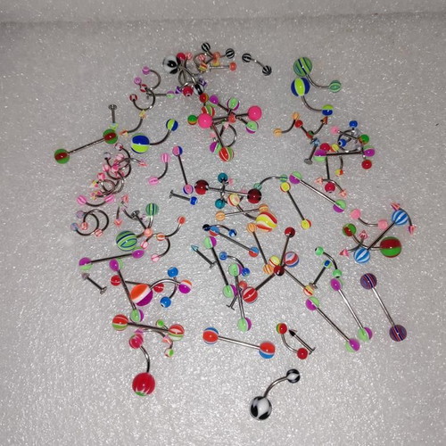 Piercing earrings set like new, 100 pieces, various designs and colors