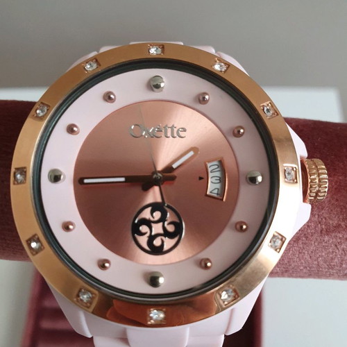 Oxette pink women's watch with rubber strap and pink gold dial like new