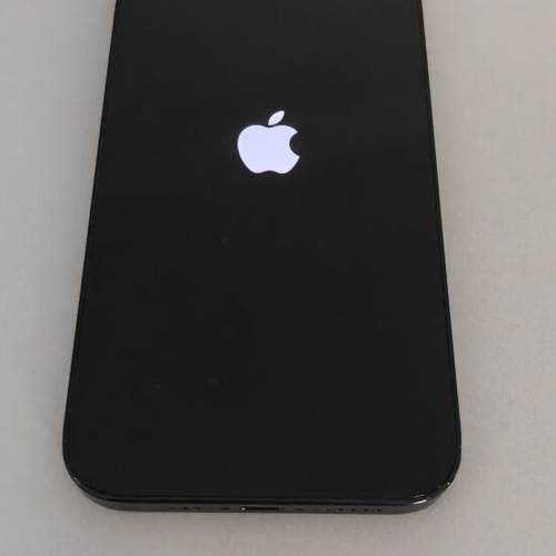 iPhone 13 128GB used with charger, earphones, cases, and power bank