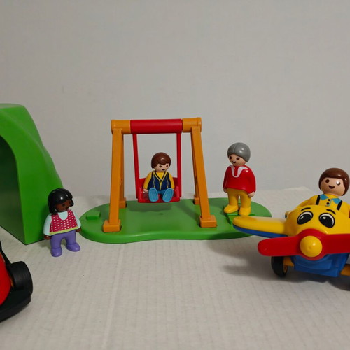 Playmobil set used with swing, airplane, formula car, bench