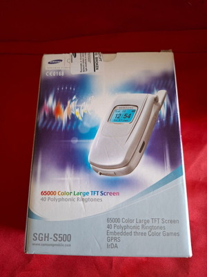 Samsung SGH-S500 collectible used packaging with spare gray battery