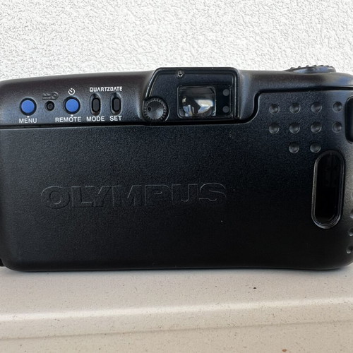 Olympus Super Zoom and Nikon Zoom Touch 600 cameras used