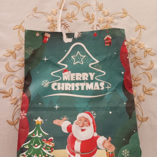 Christmas paper bag medium size used with tear
