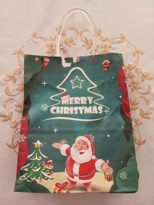Christmas paper bag medium size used with tear