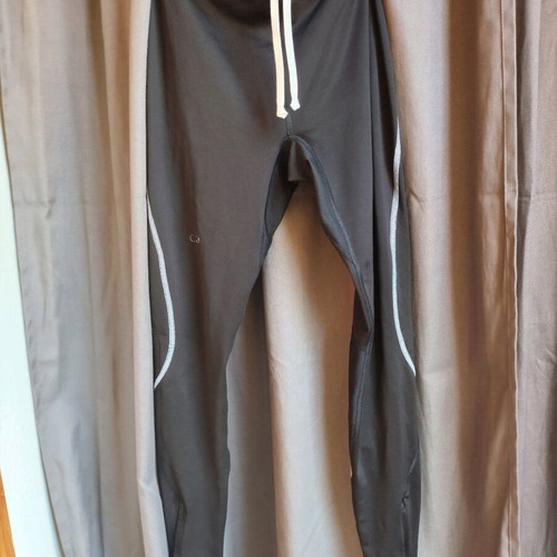 Leggings used black with gray details and ankle zippers