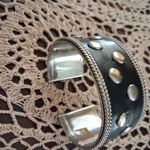 Metal bracelet with studs like new, leather and metal