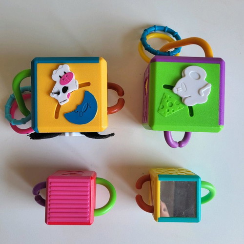 4 Hasbro Chain Cubes used, educational toy