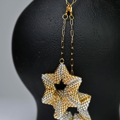Necklace with two star pendants in white and gold custom made