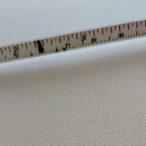 Measuring tape used in centimeters and inches, unknown origin