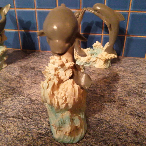 Dolphin Figures used, set of 4 ceramic wave decor
