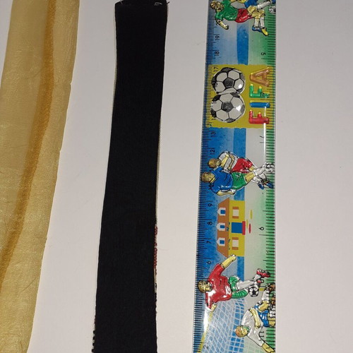 Handmade bookmark with embroidered pattern in black and ecru