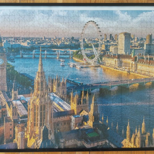 Framed puzzle like new, dimensions 0.53x0.73 m
