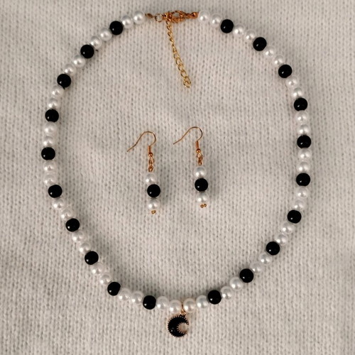 Handmade black-white beaded necklace and earings set.
