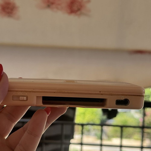 Nintendo DS used with 5 game cartridges and charger