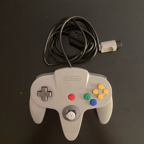 Nintendo 64 used with two controllers and Turok 2 Seeds of Evil game
