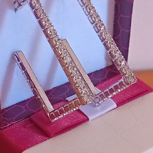 Rectangular silver hoop earrings with rhinestones, like new