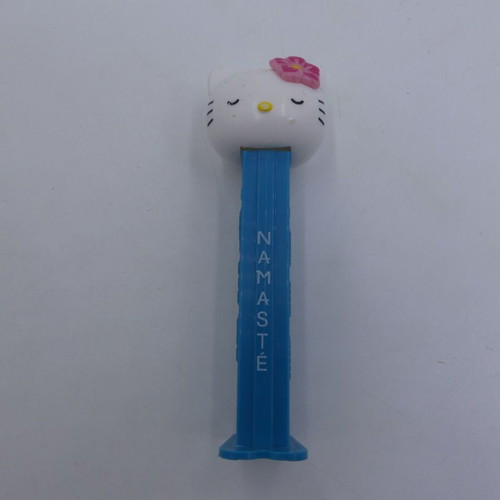Hello Kitty Pez Dispenser used, Yoga Pez Namaste pink flower