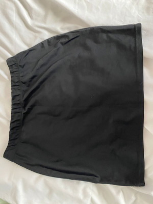 Complot black mini skirt size M like new
