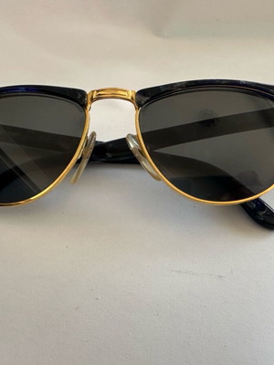 Vintage Kurzenberger sunglasses with blue marbled frame and golden details