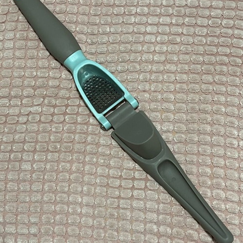 Garlic press used with ergonomic handle and easy cleaning