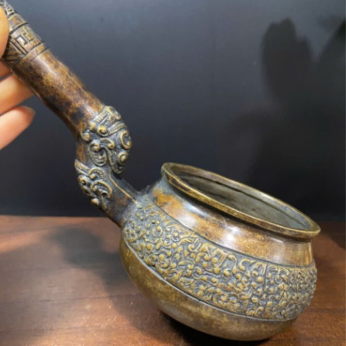Antique Vietnamese bronze vessel used with dragon and floral design
