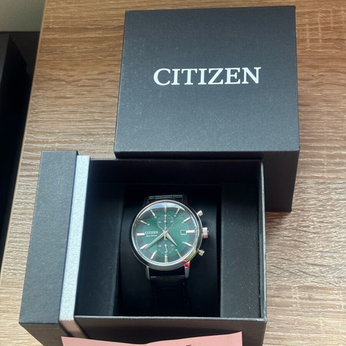 Citizen Eco Drive CA7069-24X watch like new, green dial, leather strap