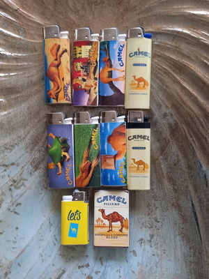Винтидж колекционерски запалки Camel, 9 броя и кибритена кутия като нови