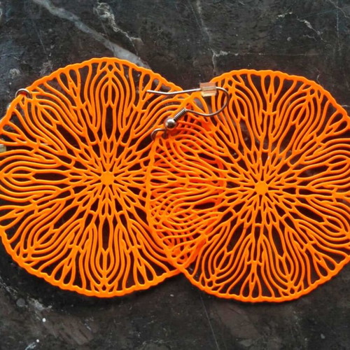 Vintage earrings orange discs new with floral design