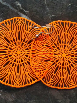 Vintage earrings orange discs new with floral design